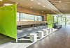 Swimming pool changing room with antimicrobial surfaces